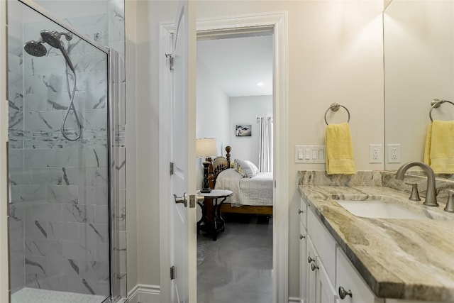 139 W Maple Dr, Marble Falls, TX 78654 - full bath featuring vanity, a stall shower, connected bathroom, and finished concrete flooring