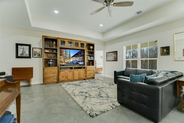 139 W Maple Dr, Marble Falls, TX 78654 - living area with ceiling fan, finished concrete floors, baseboards, a tray ceiling, and recessed lighting