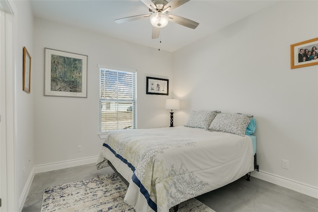 139 W Maple Dr, Marble Falls, TX 78654 - bedroom featuring concrete flooring, baseboards, and a ceiling fan