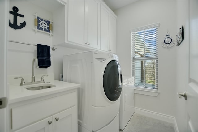 139 W Maple Dr, Marble Falls, TX 78654 - laundry room with cabinet space and baseboards