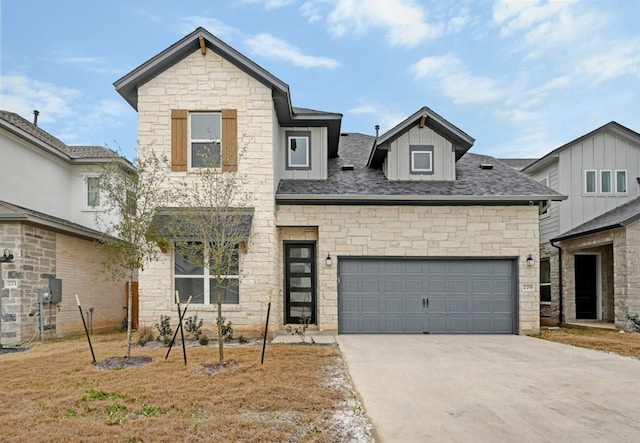 view of front facade featuring driveway, roof with shingles, and an attached garage