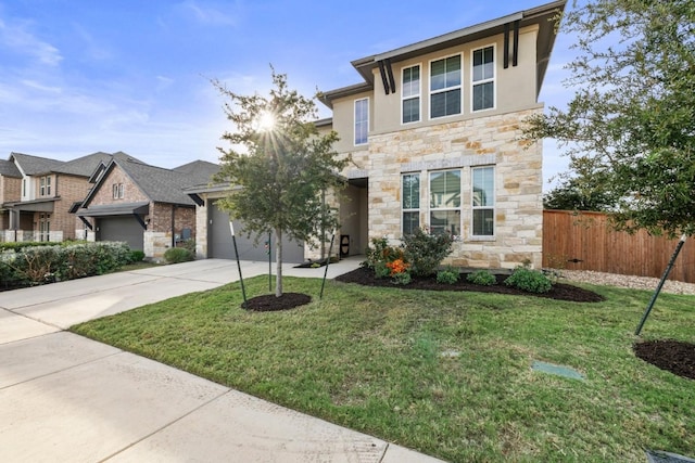 view of front of house featuring concrete driveway, a front lawn, fence, and stucco siding