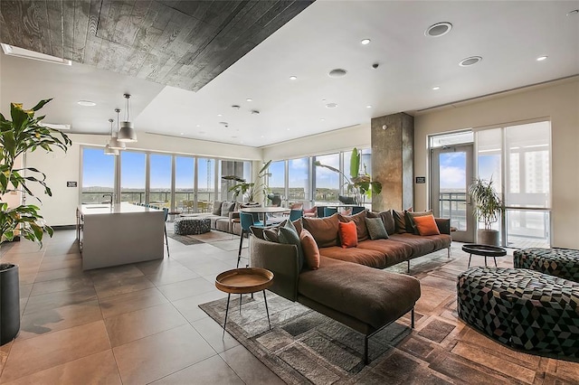 222 W Ave Unit 2403, Austin, TX 78701 - living area featuring light tile patterned flooring and recessed lighting