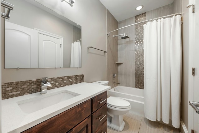 full bath featuring shower / bath combination with curtain, toilet, vanity, and decorative backsplash