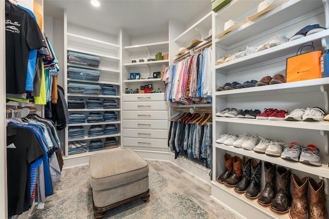 spacious closet featuring wood finished floors