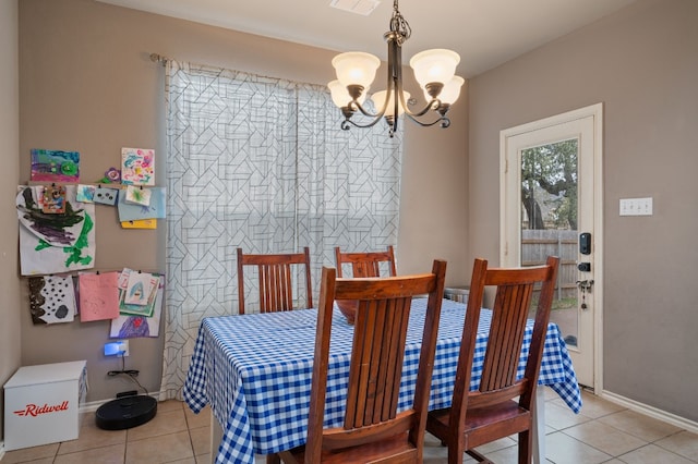 605 Hickory Run Dr, Cedar Park, TX 78613 - dining space featuring light tile patterned flooring, a chandelier, and baseboards