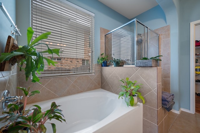605 Hickory Run Dr, Cedar Park, TX 78613 - bathroom featuring a shower stall, a garden tub, and tile patterned floors