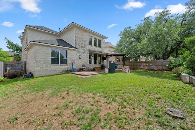 605 Hickory Run Dr, Cedar Park, TX 78613 - back of property with a patio, stone siding, and roof with shingles