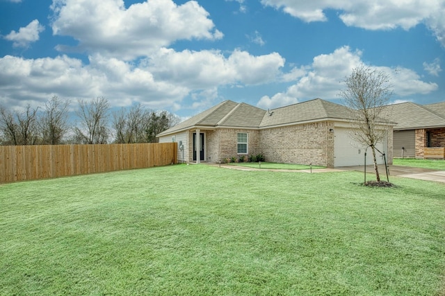 13029 Field Plow Ln, Elgin, TX 78621 - ranch-style home with a garage, driveway, brick siding, and a shingled roof