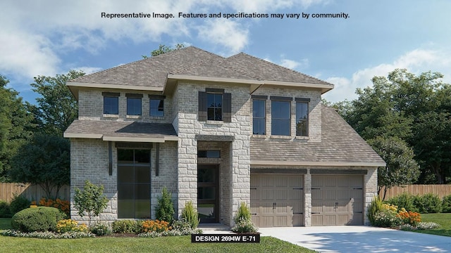 view of front facade featuring stone siding, fence, and an attached garage