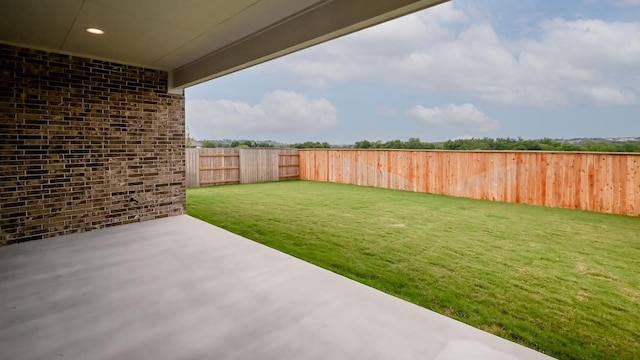 702 Bay Breeze Dr, Kyle, TX 78640 - fenced backyard with a patio