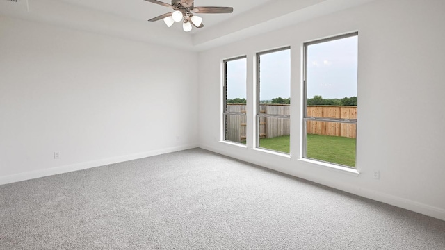 702 Bay Breeze Dr, Kyle, TX 78640 - carpeted spare room with a ceiling fan and baseboards