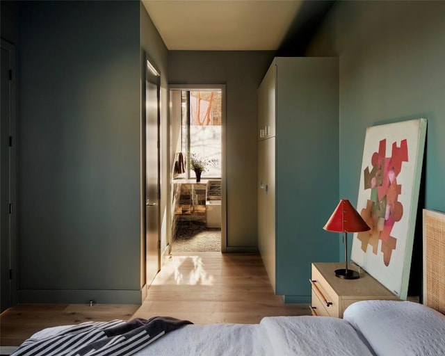 bedroom featuring light wood finished floors