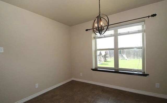 503 W Gemini Ln, Killeen, TX 76542 - unfurnished room featuring plenty of natural light and a chandelier