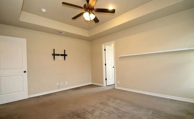 503 W Gemini Ln, Killeen, TX 76542 - spare room with ceiling fan, carpet floors, a raised ceiling, and a smoke detector