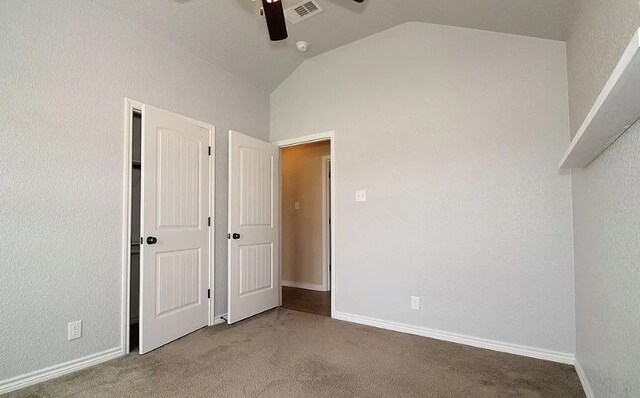 503 W Gemini Ln, Killeen, TX 76542 - unfurnished bedroom with carpet floors, vaulted ceiling, ceiling fan, and a textured wall
