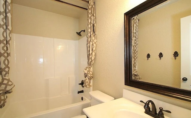 503 W Gemini Ln, Killeen, TX 76542 - bathroom with shower / bath combination with curtain, vanity, and a textured wall