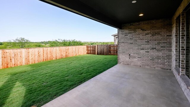 657 Bay Breeze Dr, Kyle, TX 78640 - fenced backyard with a patio