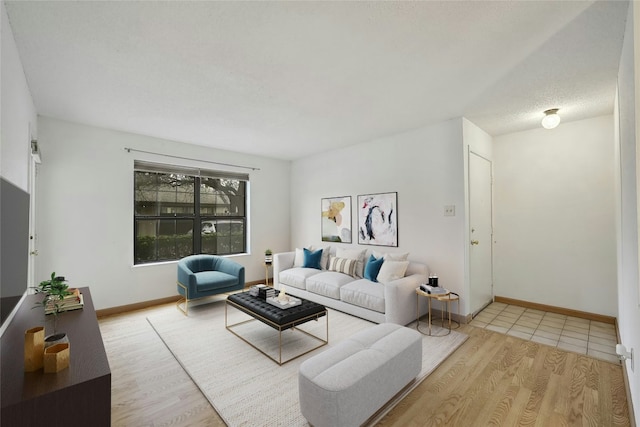 8210 Bent Tree Rd Unit 115, Austin, TX 78759 - living room featuring wood finished floors and baseboards
