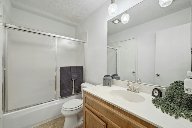8210 Bent Tree Rd Unit 115, Austin, TX 78759 - bathroom featuring vanity, shower / bath combination with glass door, and a textured ceiling