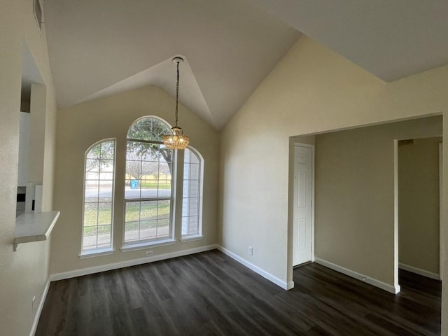 unfurnished dining area with lofted ceiling, plenty of natural light, a chandelier, and dark wood-style flooring