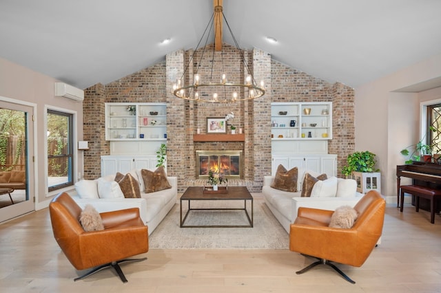 4704 Wild Briar Pass, Austin, TX 78746 - living room featuring plenty of natural light, brick wall, a brick fireplace, a chandelier, and wood finished floors