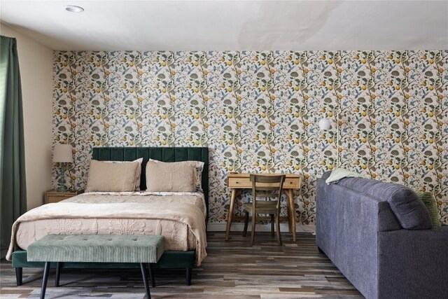 4704 Wild Briar Pass, Austin, TX 78746 - bedroom with wood finished floors and wallpapered walls