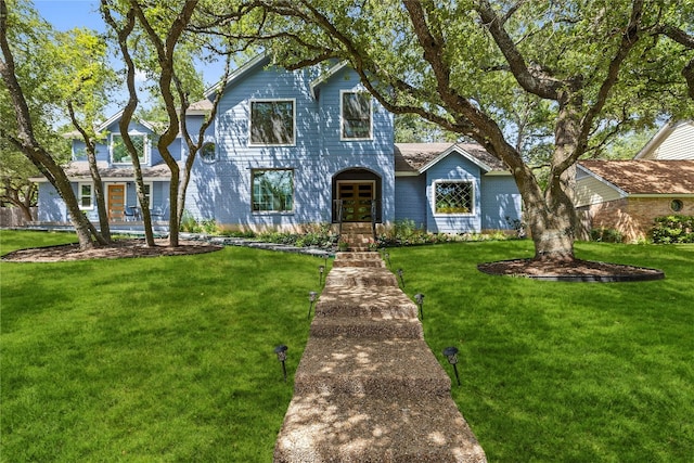 4704 Wild Briar Pass, Austin, TX 78746 - traditional home with french doors and a front lawn