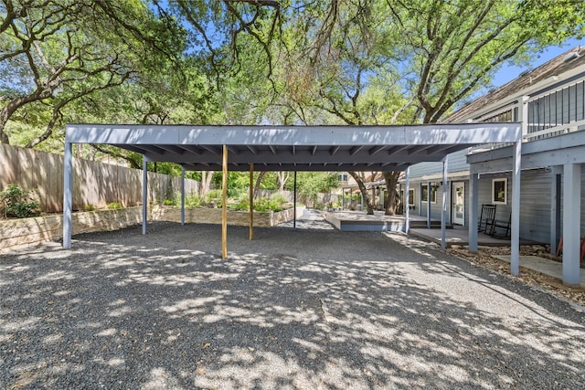 4704 Wild Briar Pass, Austin, TX 78746 - view of vehicle parking featuring driveway and a carport