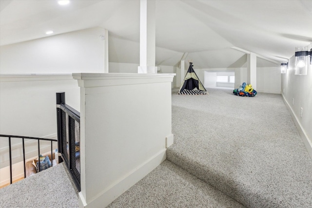 bonus room featuring baseboards, vaulted ceiling, and recessed lighting