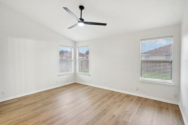 114 Challenger, Kyle, TX 78640 - empty room with light wood-type flooring, a ceiling fan, baseboards, and vaulted ceiling