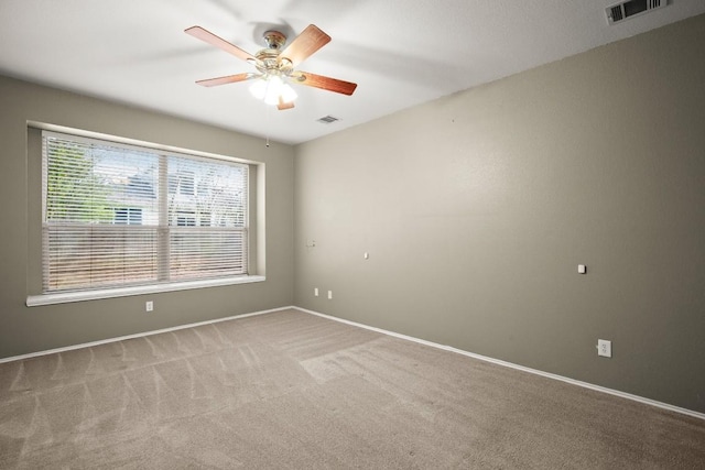 19907 Kennemer Dr, Pflugerville, TX 78660 - carpeted empty room with a ceiling fan and baseboards