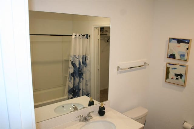 full bath with vanity, toilet, and shower / tub combo with curtain