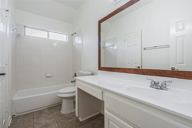 full bathroom with tile patterned flooring, bathtub / shower combination, vanity, and toilet