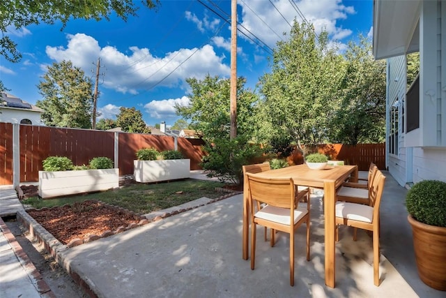 6205 York Bridge Cir, Austin, TX 78749 - fenced backyard with a patio area and outdoor dining space