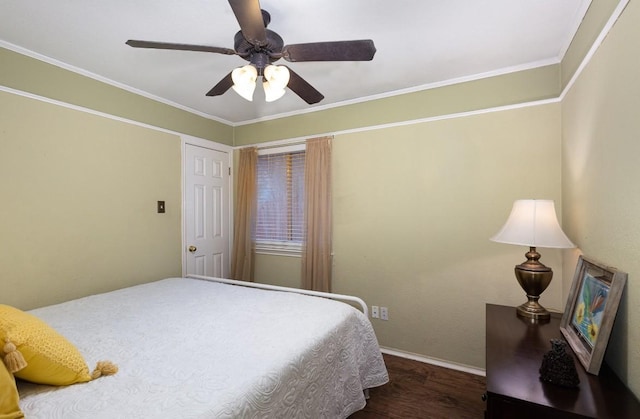 bedroom with dark wood-style floors, ceiling fan, and crown molding