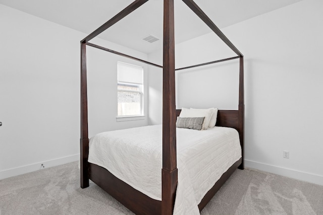 bedroom featuring carpet flooring, baseboards, and visible vents