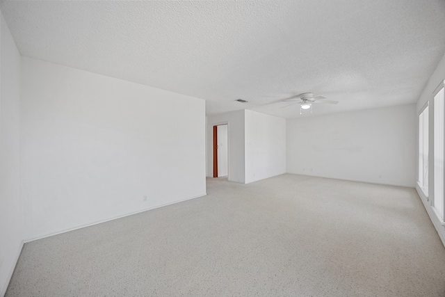 11512 Tin Cup Dr Unit 211, Austin, TX 78750 - unfurnished room with ceiling fan and a textured ceiling