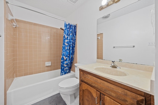 11512 Tin Cup Dr Unit 211, Austin, TX 78750 - full bath with toilet, vanity, shower / tub combo, and a textured ceiling