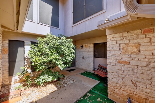 11512 Tin Cup Dr Unit 211, Austin, TX 78750 - entrance to property with stone siding