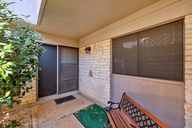 11512 Tin Cup Dr Unit 211, Austin, TX 78750 - view of exterior entry with stone siding