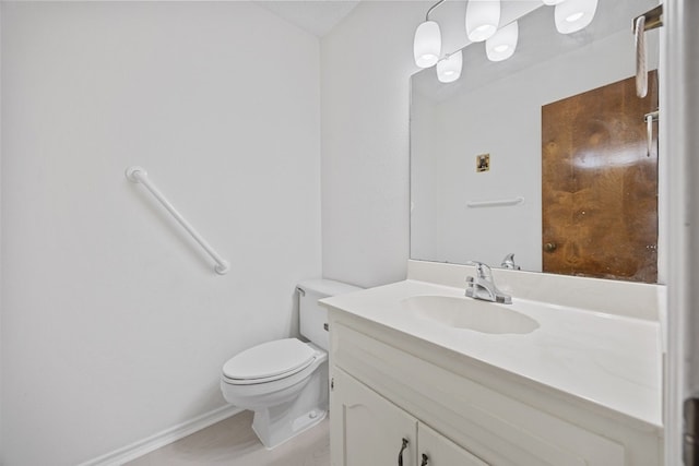 11512 Tin Cup Dr Unit 211, Austin, TX 78750 - bathroom with toilet, vanity, and baseboards