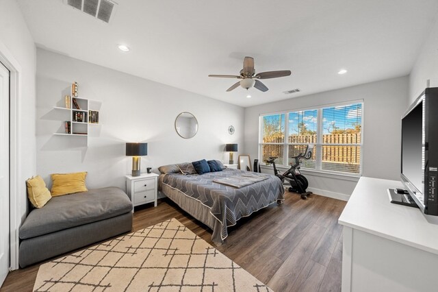 bedroom with recessed lighting, visible vents, and wood finished floors