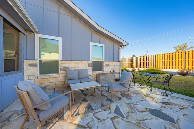 view of patio / terrace featuring fence