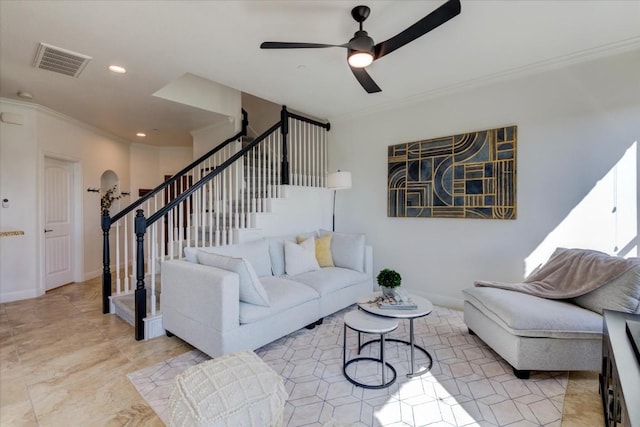 living area with visible vents, crown molding, stairway, and baseboards