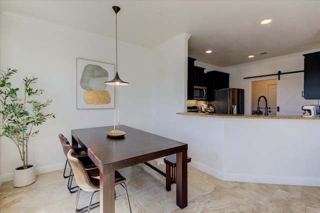 700 Mandarin Flyway Dr Unit 1702, Cedar Park, TX 78613 - dining area featuring ornamental molding, recessed lighting, baseboards, and a barn door