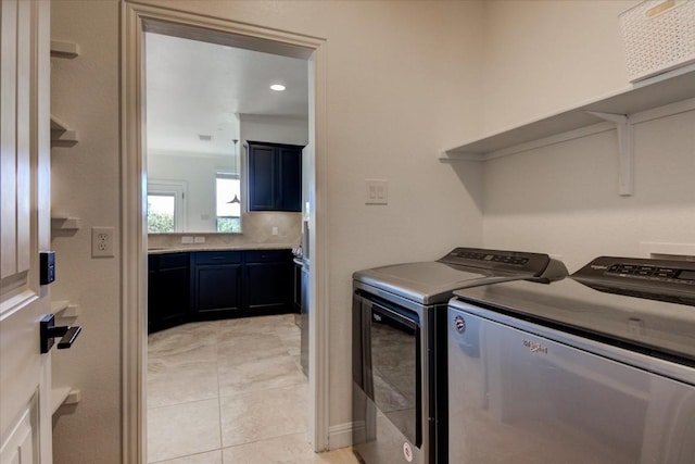 700 Mandarin Flyway Dr Unit 1702, Cedar Park, TX 78613 - washroom featuring washing machine and dryer and light tile patterned flooring
