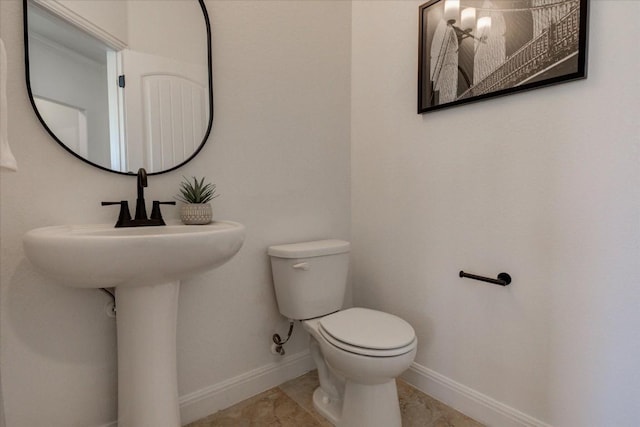 700 Mandarin Flyway Dr Unit 1702, Cedar Park, TX 78613 - bathroom featuring toilet and baseboards