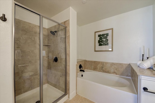 full bath with a stall shower, tile patterned floors, and a bath