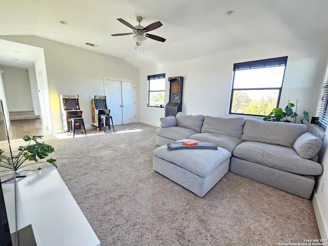 5922 Keller Rdg, New Braunfels, TX 78132 - living area with lofted ceiling, carpet floors, and a ceiling fan